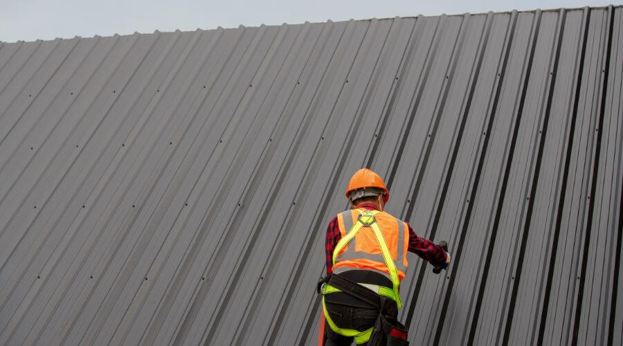 Professional metal roof installation services in Pointe Aux Pins, MI